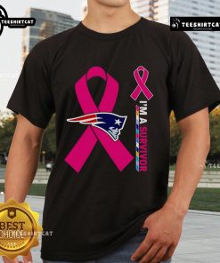 Official New England Patriots X Cancer Awareness I'M A Survivor T-Shirt featuring team logo and vibrant pink design.