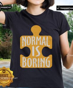 Official Normal Is Boring Puzzle Piece Autism Awareness Ladies Tee featuring colorful puzzle design on a soft fabric.