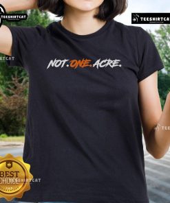 Official Not One Acre Ladies Tee showcasing stylish design and comfortable fit for casual wear.