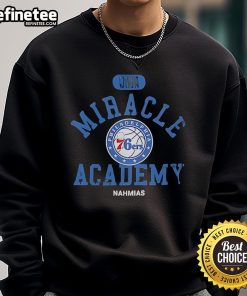 Official Philadelphia 76ers Miracle Academy NBA Collection Sweatshirt in blue, showcasing team logo and stylish design.