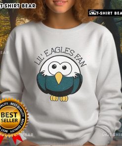 Adorable Lil Eagles fan in an official Philadelphia Eagles NFL football sweatshirt, showing team spirit and style.