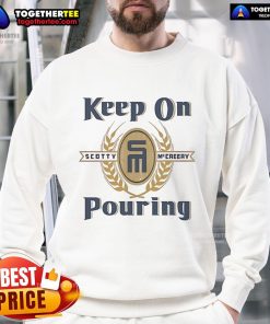 Alt Text: Official Scotty McCreery Keep On Pouring Sweatshirt featuring a stylish design, perfect for fans and casual wear.