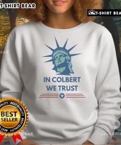 Official Stephen Colbert 'In Colbert We Trust' sweatshirt featuring bold text design and vibrant color scheme.