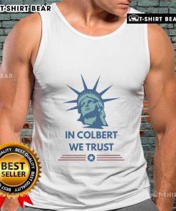 Official Stephen Colbert In Colbert We Trust tank top featuring bold text design and vibrant colors for fans.