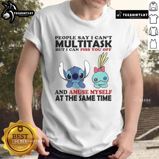 Alt Text: Official Stitch And Scrump People Say I Can't Multitask T-Shirt featuring playful graphics and vibrant colors.