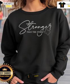 Alt Text: Official Stronger Than The Storm Sweatshirt featuring a cozy design and vibrant graphics for ultimate comfort.