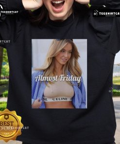 Sydney Sweeney wearing Celine crop top and Almost Friday sweatshirt, showcasing trendy street style fashion.