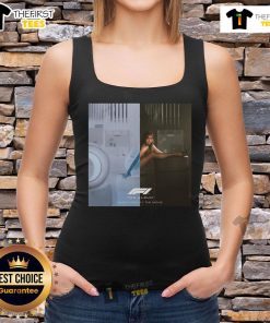 Alt Text: Official Tate McRae Just Keep Watching album tank top featuring vibrant graphics and F1 movie branding.