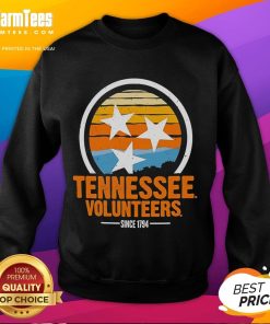 Alt Text: Vintage Tennessee Volunteers sweatshirt since 1794, featuring classic orange and white colors with school logo.
