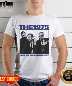 Alt Text: Official The 1975 Live At Glastonbury Vintage T-Shirt featuring iconic band logo and festival graphics on a classic tee.