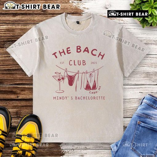 Official The Bach Club Est 2025 Mindy's Bachelorette washed t-shirt featuring a stylish design perfect for celebrations.