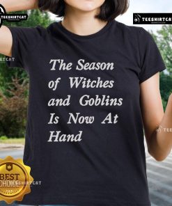 Official Season of Witches and Goblins Ladies Tee featuring spooky designs perfect for Halloween festivities.