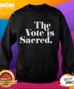 Alt Text: Official The Vote Is Sacred Sweatshirt featuring bold text design, perfect for promoting civic engagement and voter rights.