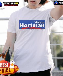 Tim and Gwen Walz wearing Melissa Hortman t-shirts at an event, showcasing their support for the local community.