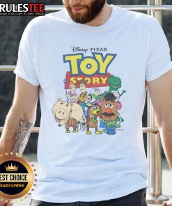 Alt Text: Official Toy Story Characters T-Shirt featuring Woody, Buzz Lightyear, and Jessie in vibrant colors and fun design.