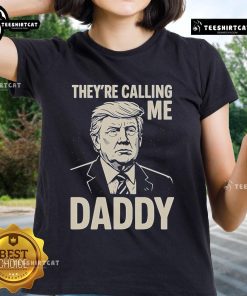 Alt Text: Official Trump 'They're Calling Me Daddy' Ladies Tee featuring bold graphics on a stylish women's shirt.