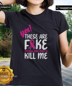 Official Breast Cancer Awareness ladies tee with 'Yes, these are fake. My real one tried to kill me' slogan.
