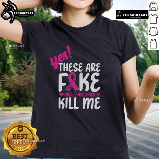 Official Breast Cancer Awareness ladies tee with 'Yes, these are fake. My real one tried to kill me' slogan.