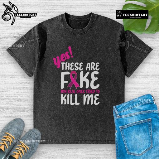 Official 'Yes, These Are Fake' breast cancer awareness washed t-shirt showcasing support and humor in the fight against cancer.