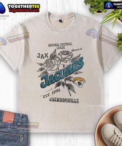 Alt Text: Original Jacksonville Jaguars washed t-shirt, NFL established 1995, featuring team logo and vintage design.