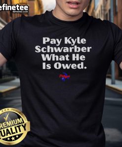 Original Pay Kyle Schwarber What He Is Owed T-Shirt for Philadelphia Phillies fans, featuring bold graphics and team colors.