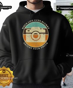 Vintage camera quote hoodie: 'When life gets blurry, adjust your focus' in stylish design for photography lovers.