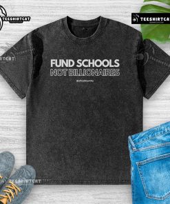 Premium Fund Schools Not Billionaires Washed T-Shirt featuring a bold slogan on soft fabric, ideal for casual wear.