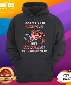Alt Text: Premium I Don't Live in Cincinnati But Cincinnati Will Always Live in Me hoodie featuring local sports team logos.