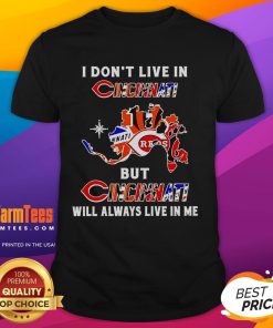 Alt Text: Premium 'I Don't Live In Cincinnati But Cincinnati Will Always Live In Me' T-Shirt celebrating Cincinnati sports teams.