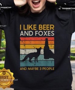 Alt Text: Vintage sweatshirt featuring the phrase I Like Beer And Foxes And Maybe 3 People with a playful fox design.