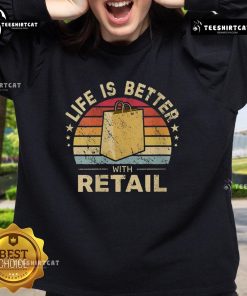 Alt Text: Vintage sunset sweatshirt featuring Premium Life is Better with Retail design, perfect for casual wear.