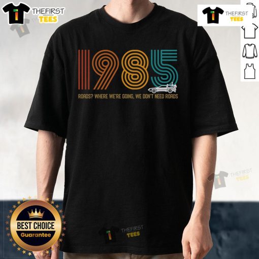 1985 vintage t-shirt featuring 'Premium Roads Where Were Going We Dont Need Roads' graphic design for retro fashion lovers.