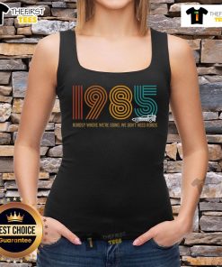 1985 vintage tank top featuring 'Premium Roads - Where We're Going We Don't Need Roads' design for retro fashion lovers.