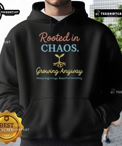 Premium hoodie featuring 'Rooted in Chaos' design, symbolizing messy beginnings and beautiful becoming.