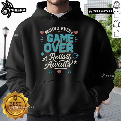 Pretty Behind Every Game Over A Restart Awaits Hoodie in vibrant colors, showcasing a stylish design for gamers.