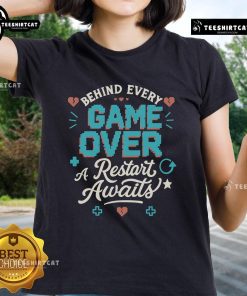Pretty Behind Every Game Over, A Restart Awaits Ladies Tee featuring a stylish design perfect for gamers and fashion lovers.