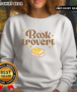 Cozy sweatshirt with 'Pretty Booktrovert' design, perfect for funny book lovers who enjoy reading in comfort.