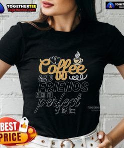 Pretty coffee and friends enjoying a cozy moment in a stylish ladies tee, perfect mix of comfort and style.