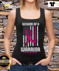 Pretty husband of a warrior in an American flag breast cancer awareness tank top, promoting resilience and support.