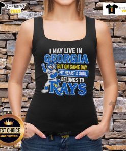 Alt Text: Woman wearing a Tampa Bay Rays tank top, showcasing pride for the team while living in Georgia on Game Day.