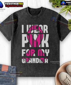 Alt Text: Pretty I Wear Pink for My Grandma Breast Cancer Awareness washed t-shirt displayed on a wooden background.