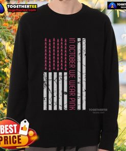 Pretty in October: Women wearing pink America flag sweatshirt for Breast Cancer Awareness Month.