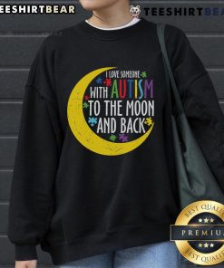 Cozy sweatshirt featuring 'Love Someone With Autism To The Moon and Back' design with puzzle piece graphic.
