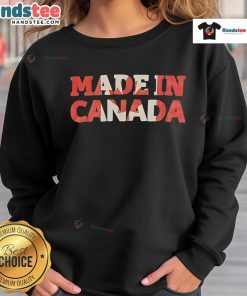 Stylish Made in Canada sweatshirt displayed on a hanger, featuring a cozy design and vibrant colors for casual wear.