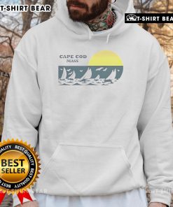 Alt Text: Sophie O'Neil wearing Pretty The Hunting Wives hoodie with cod mass design, showcasing a stylish and cozy look.