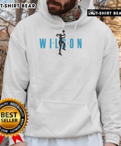 Alt Text: Aja Wilson statue displayed with a basketball hoodie, showcasing her iconic style and athletic prowess.
