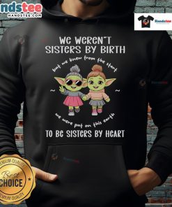 Cozy hoodie featuring Baby Yoda and the phrase 'We Weren't Sisters by Birth, But Sisters by Heart' for Star Wars fans.