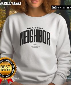 Cozy Buffalo sweatshirt with 'Be A Good Neighbor' slogan, perfect for casual wear and showing community spirit.