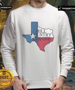 Top Brett Lee Hill Country Strong Sweatshirt in a casual setting, showcasing its stylish design and vibrant colors.