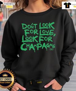 Trendy 'Don't Look For Love, Look For Champagne' sweatshirt in soft fabric, perfect for casual outings and cozy wear.